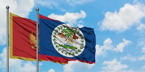 Montenegro and Belize flag waving in the wind against white cloudy blue sky together. Diplomacy...