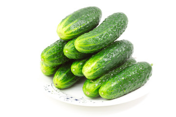 green cucumbers on a white background