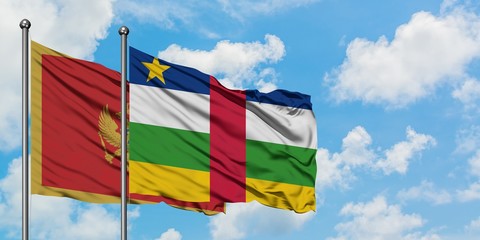 Montenegro and Central African Republic flag waving in the wind against white cloudy blue sky together. Diplomacy concept, international relations.
