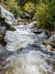 Eresma river as it passes through Boca del Asno among the granite rocks in Valsain, Segovia, Spain