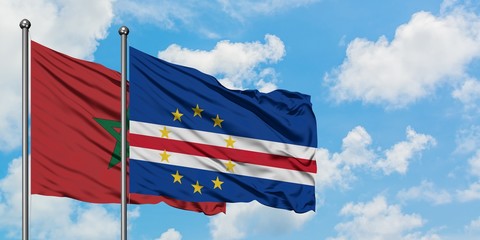 Morocco and Cape Verde flag waving in the wind against white cloudy blue sky together. Diplomacy concept, international relations.