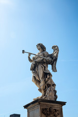 Fototapeta na wymiar Statue on Sant'Angelo bridge