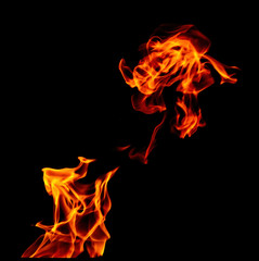 Fire flame isolated on black background.