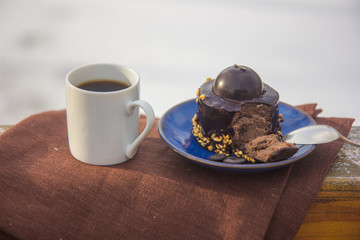 Christmas cheesecake traditional winter cake recipe . Cheese cake and coffee whole. winter natural river landscape.
