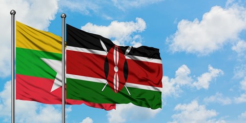 Myanmar and Kenya flag waving in the wind against white cloudy blue sky together. Diplomacy concept, international relations.