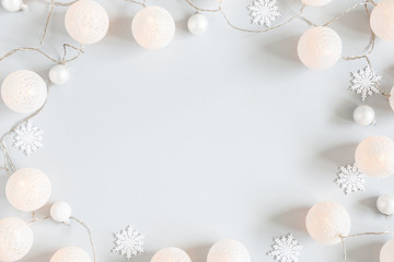 Christmas composition. Garland, christmas decorations on gray background. Christmas, winter concept. Flat lay, top view, copy space