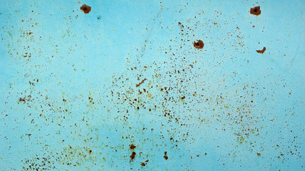 texture old blue painted metal plate nailed rusting and crumbling
