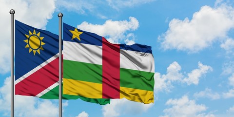 Namibia and Central African Republic flag waving in the wind against white cloudy blue sky together. Diplomacy concept, international relations.