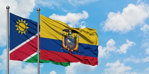 Namibia and Ecuador flag waving in the wind against white cloudy blue sky together. Diplomacy concept, international relations.