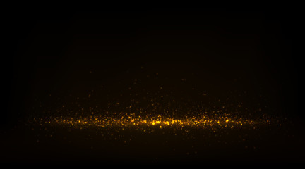 Abstract luxury background with sparkling golden dust and glowing particles	