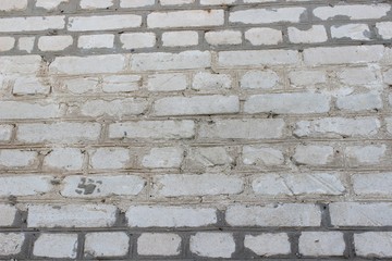 Background brickwork of old white silicate brick