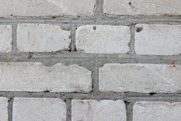 Background brickwork of old white silicate brick