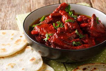 Jungli Laal Maas -A famous dish from Rajasthan - fiery hot mutton dish close-up. horizontal
