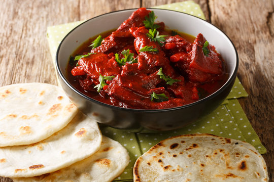 Recipe for Junglee Maas or Jungli Laal Maas close-up in the bowl. horizontal