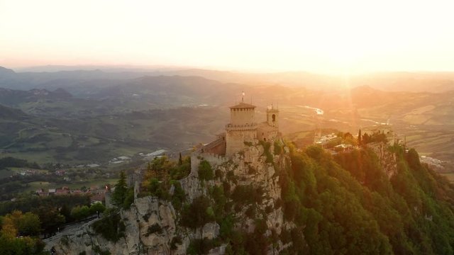 Flying over the amazing hilltop fortresses on Monte Titano in San Marino. San Marino one of the smallest countries in the world and completely surrounded by Italy.