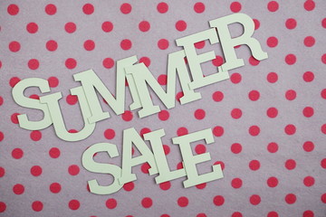 Summer Sale alphabet letters with spce copy on Pink polka dot background