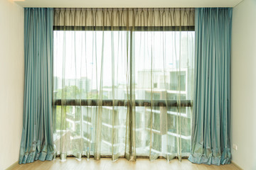 Obraz na płótnie Canvas Beautiful window and curtain decoration interior