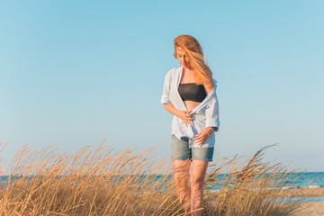 Vogue concept. Plus size model in holidays, modern woman wear casual romantic look . Fashionable lady outdoors portrait
