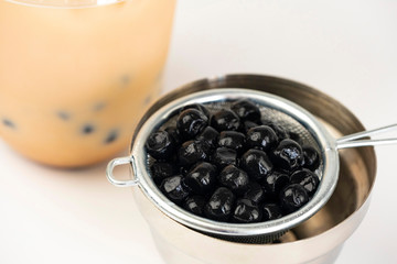 tapioca ball, boba in bubble tea, jelly ball, bubble milk tea ingredient.