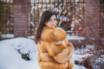 Vogue concept. Beautiful arabic lady in holidays, modern woman wear fur coat look . Fashionable...