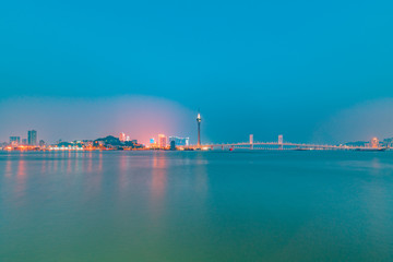 Night view of Macau Island on the other side of Zhuhai