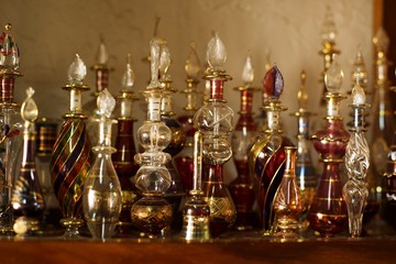 Fototapeta na wymiar old and antique Perfume bottles used in meddle East and Iran , Bottles For Ancient Medicine. Flasks and Vials For Liquid Chemicals . lots of vintage, collection of colorful old glass bottles, 