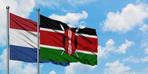 Netherlands and Kenya flag waving in the wind against white cloudy blue sky together. Diplomacy concept, international relations.