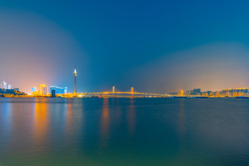 Night view of Macau Island on the other side of Zhuhai