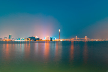 Night view of Macau Island on the other side of Zhuhai