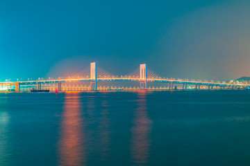 Night view of Macau Island on the other side of Zhuhai