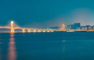 Obraz premium Night view of Macau Island on the other side of Zhuhai