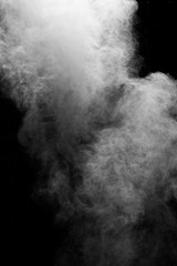 Explosion of colored powder isolated on black background. Abstract colored background. holi festival.