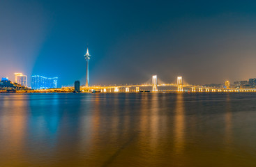Night view of Macau Island on the other side of Zhuhai