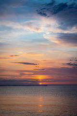 Fototapeta premium Colourful sunrise at the sea