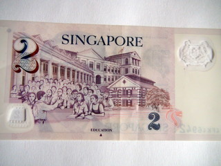 Paper money of the countries of the world. Singapore dollars. A denomination of two Singapore dollars.