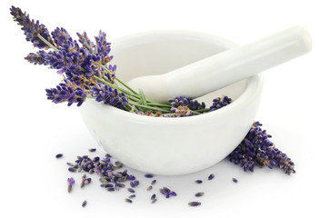 Lavender flower in a mortar with pestle