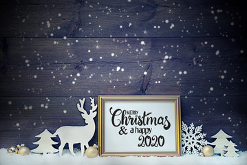 Frame With English Calligraphy Merry Christmas And A Happy 2020. Golden Decoration Like Ball, Tree...