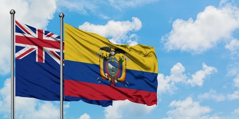 New Zealand and Ecuador flag waving in the wind against white cloudy blue sky together. Diplomacy concept, international relations.