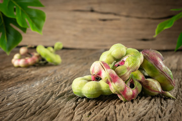Ripe Manila tamarind fruit (Pithecellobium dulce (Roxb.) Benth) isolated on white background.Fruits that help to excrete and help reduce the problem of constipation. 