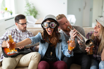 Group of happy friends having fun and party