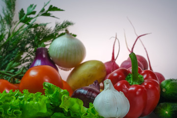Fototapeta na wymiar Various vegetables. Potatoes, onions, cabbage, peppers, garlic, carrots, radishes.