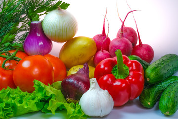 Various vegetables. Potatoes, onions, cabbage, peppers, garlic, carrots, radishes.
