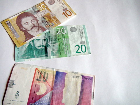 Banknotes of the world. Macedonian Denars and Serbian Dinars. Denominations of ten Macedonian Denars, as well as ten and twenty Serbian Dinars.
