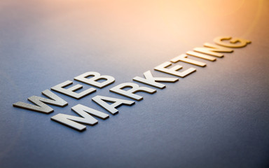 Fototapeta premium Word web marketing written with white solid letters