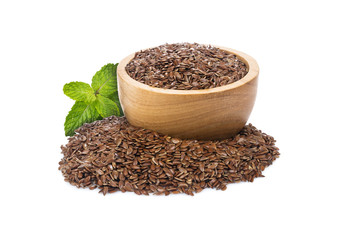 Flax seeds, linseed pile in Wooden bowl isolated on white background.Organic food concept