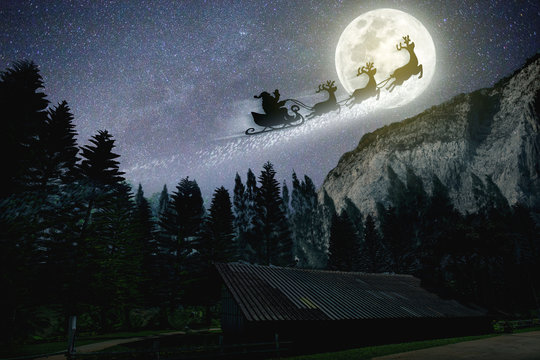 noise pic,Christmas,Merry Christmas and happy holidays! Santa Claus flying in his sleigh against moon sky.