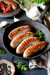 Homemade sausages from turkey (chicken) fried in a frying pan