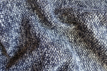 Jammed blue grey melange woolen fabric from above