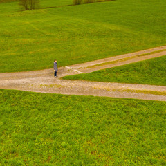 Woman at the crossroads.