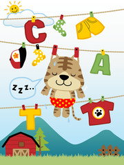 vector cartoon of little cat on clothesline with clothing and alphabet on mountain background